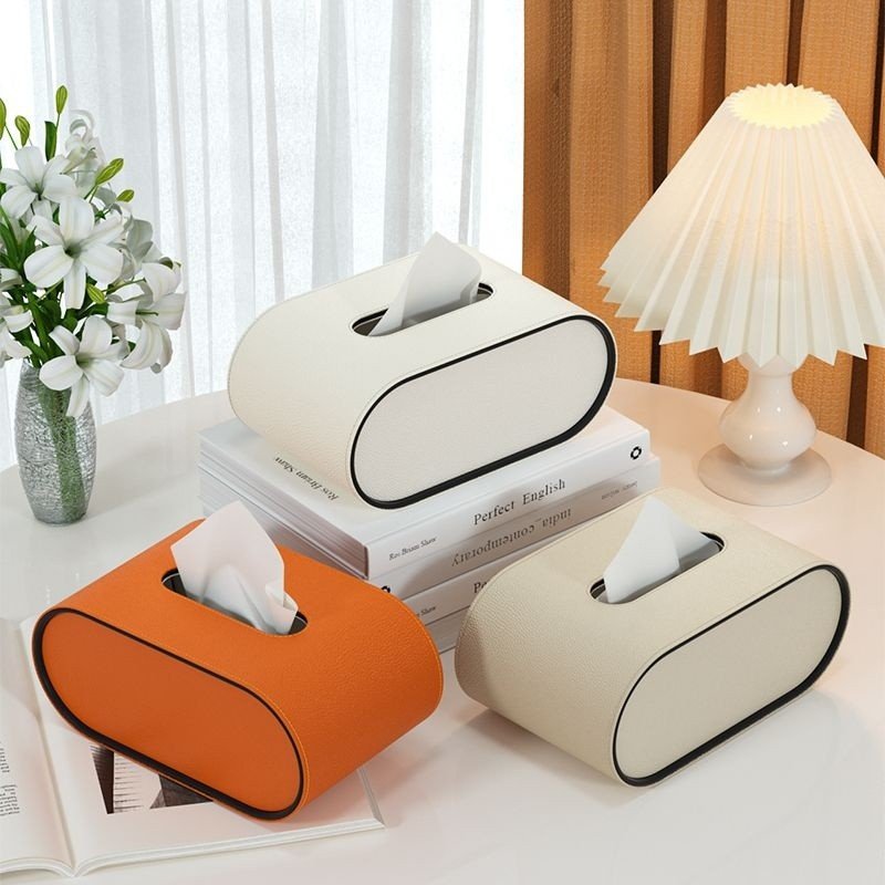 CUIRÉ – Sophisticated oval leather tissue box for modern interiors