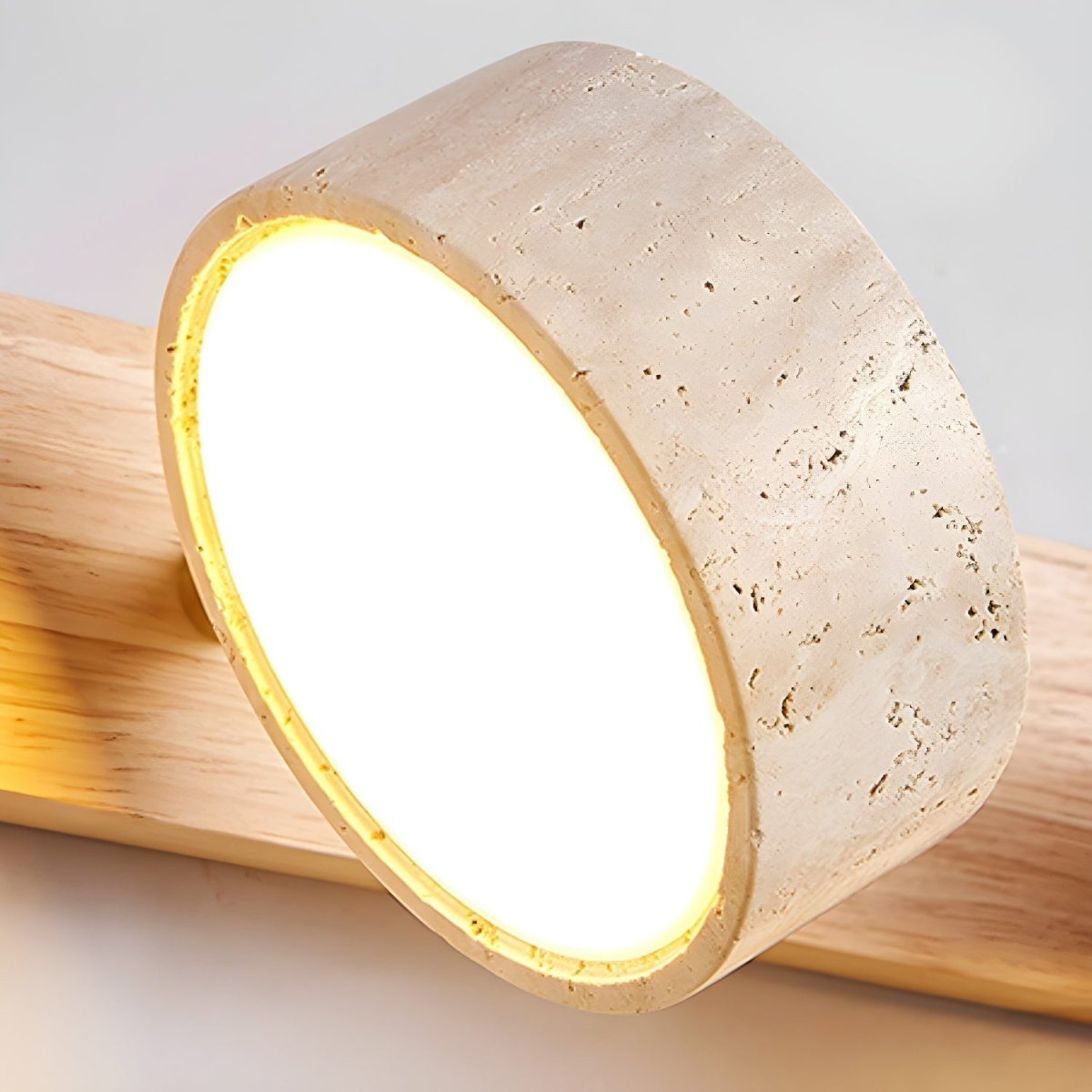 AVERRA – LED wall light made of travertine for architectural luxury