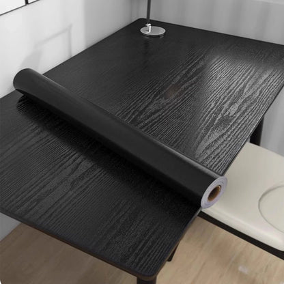 URBANDESIGN – Black peel-and-stick wallpaper in wood look for modern interior upgrades