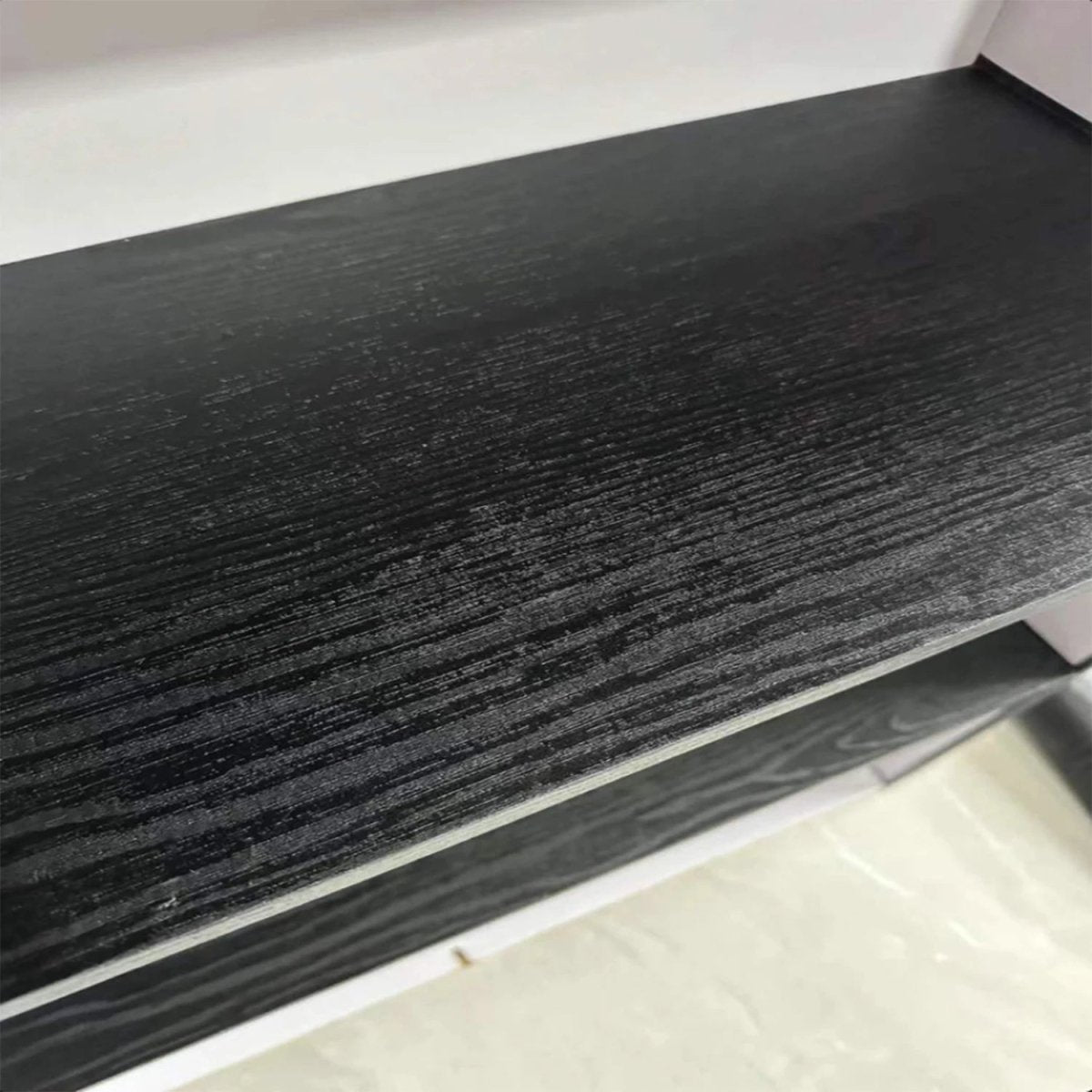 URBANDESIGN – Black peel-and-stick wallpaper in wood look for modern interior upgrades