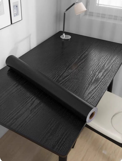 URBANDESIGN – Black peel-and-stick wallpaper in wood look for modern interior upgrades