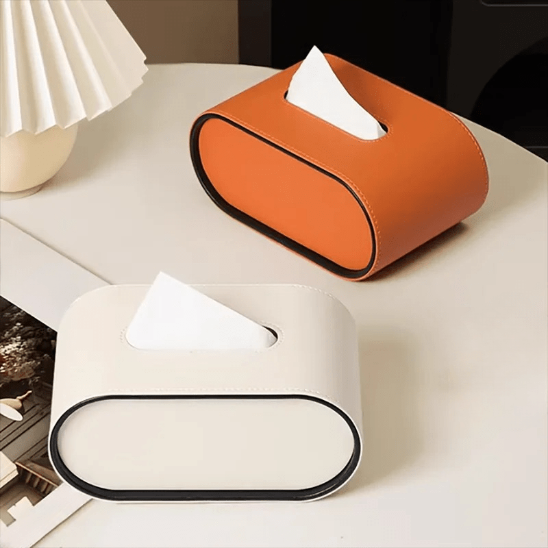 CUIRÉ – Sophisticated oval leather tissue box for modern interiors
