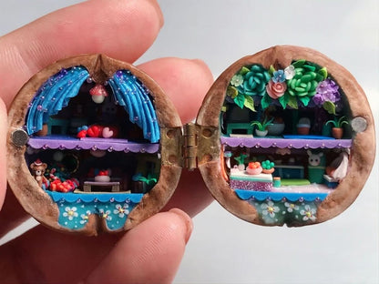 WALDWHISPER – Handmade dollhouse made from walnut shells with interior lighting